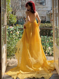 Flowing Ruffles Yellow Strapless Maxi Dress