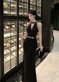 Elegant Sleeveless Black Dress with Sparkling Shoulder Details