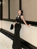 Elegant Sleeveless Black Dress with Sparkling Shoulder Details