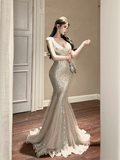 Elegant Sparkling Champagne Mermaid Dress with Chiffon Hem