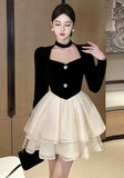 Stylish Black and White Dress with Halter Neck and Layered Skirt