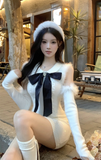 Charming White Knit Dress with Black Bow and Furry Details