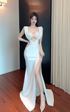 Elegant White Mermaid Gown with Cut - out Detail and High Slit