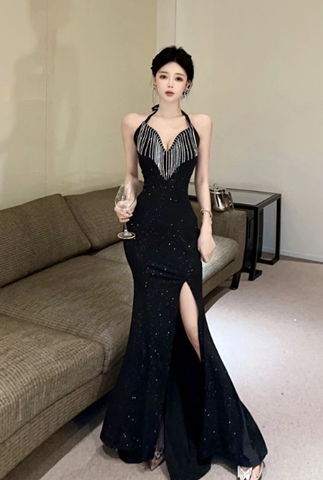 Glamorous Black Halter Gown with Sequin Embellishments and High Slit